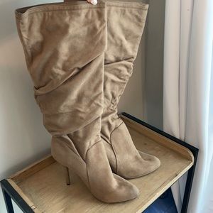 Jennifer Lopez tan suede knee high boots